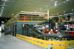 17' high shelving catwalk with conveyor